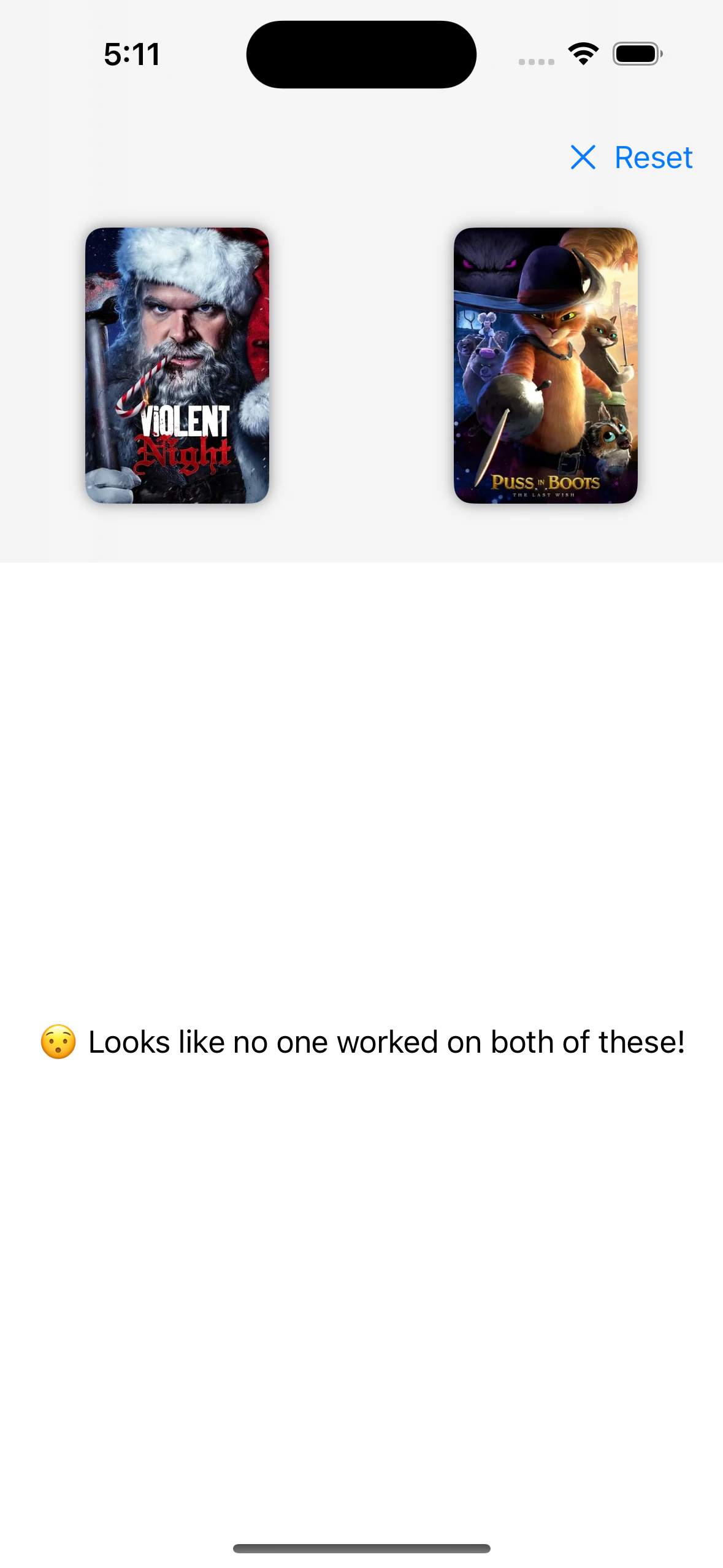 A screenshot of a comparison of the movies "Violent Night" and "Puss in Boots" showing that no one worked on both of these movies.